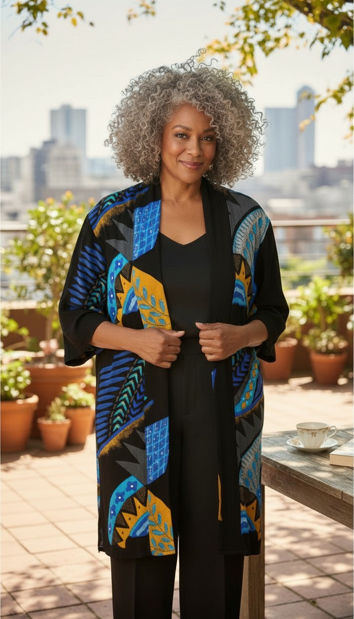 Bold Geometric Print Open Kimono Cardigan | Size M at Blue Sparrow Shop on woman in black standing outside