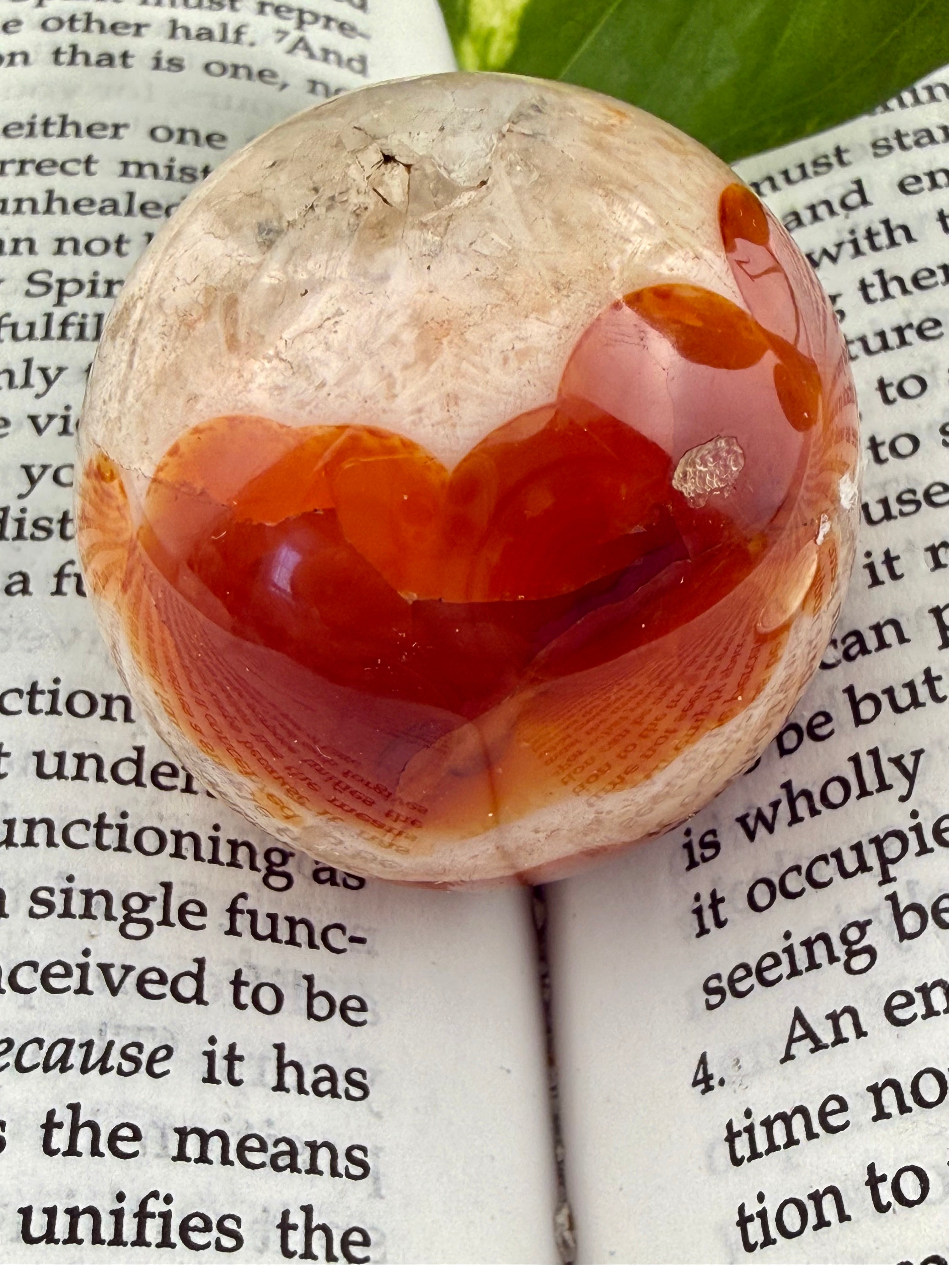 up close showing the other size of the sphere without the druzy