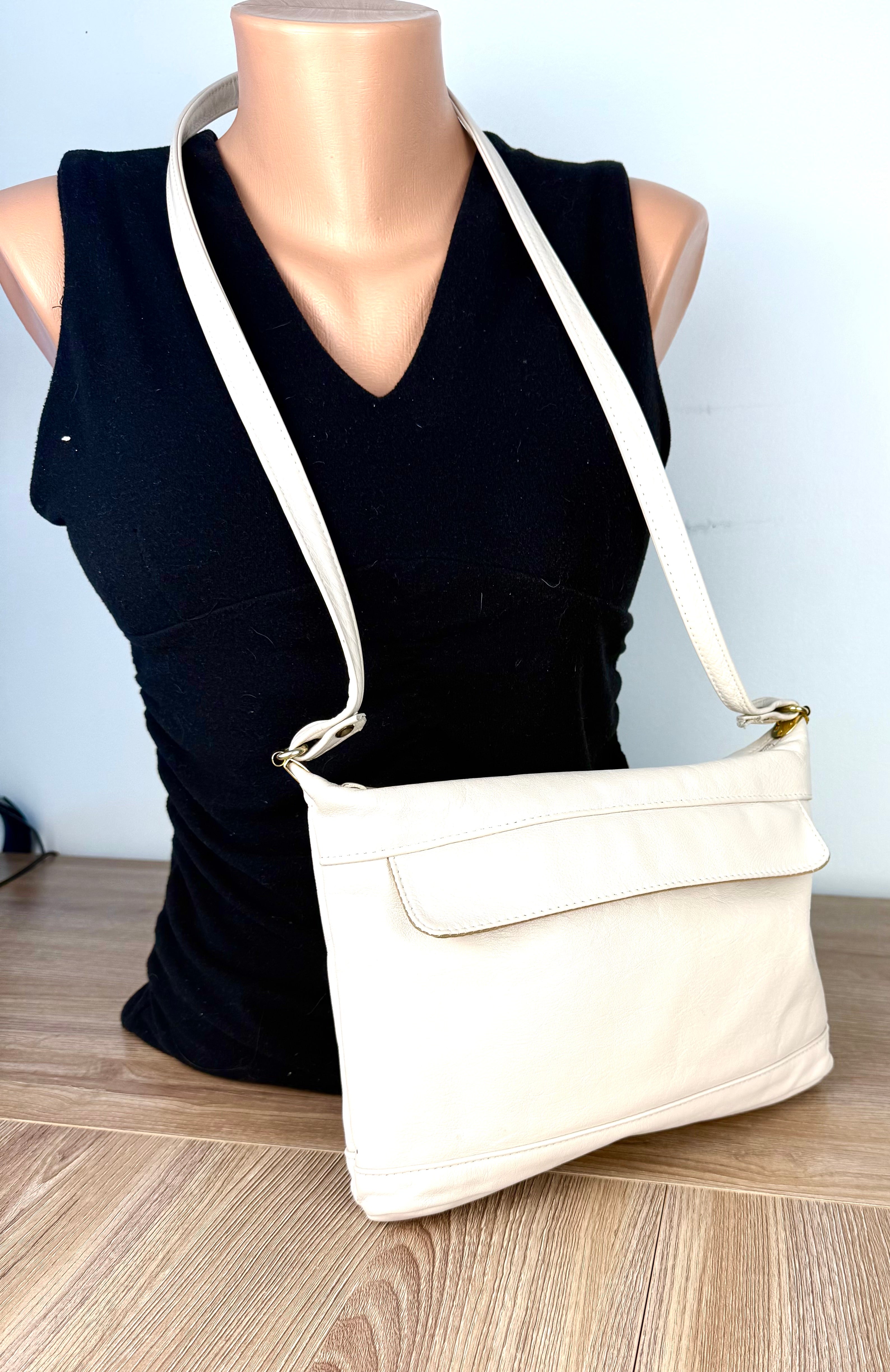 Brixton leather bag in bone colour made in Canada  on mannequin 
