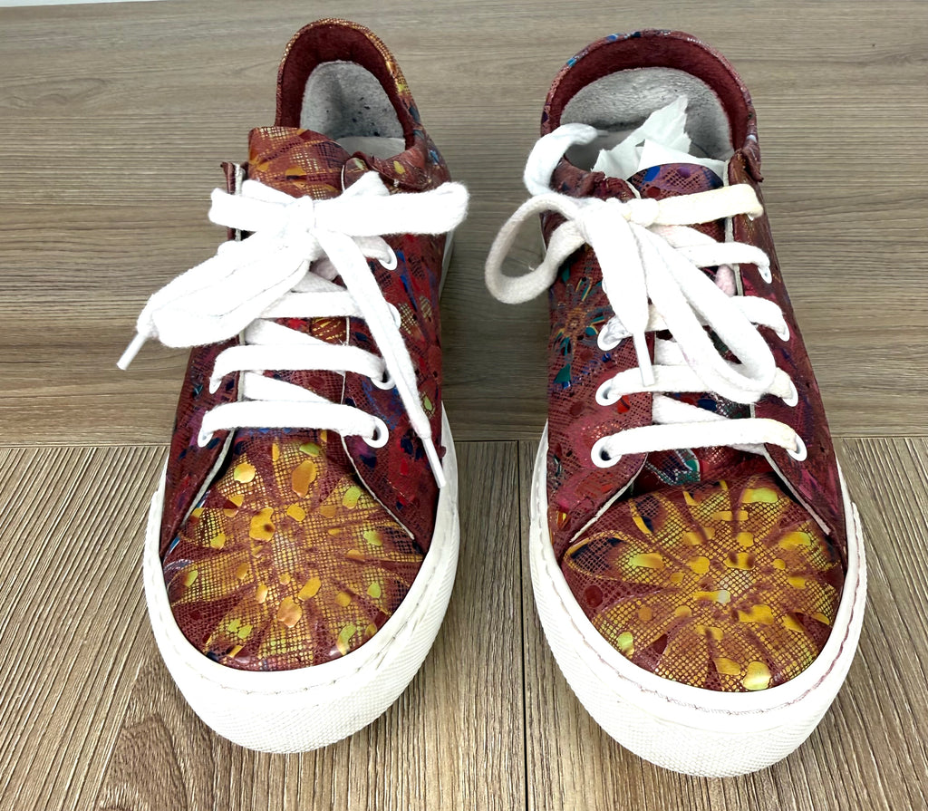 Bueno leather Stylish yet comfortable sneakers perfect for everyday wear. on table 