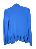 back view of Capsule wardrobe essential peplum waist cardigan in cornflower blue for a pop of colour in 2026