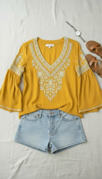 Chelsea & Theodore Embroidered Boho Blouse | Size XL lifestyle photo with shorts