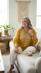 Chelsea & Theodore Embroidered Boho Blouse | Size XL on woman sitting on couch 