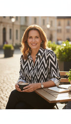 Chico’s Button-Up Blouse | Size S on woman sitting at a table outside