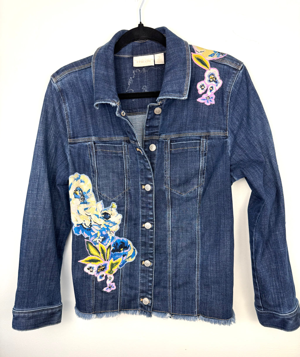 Chicos embroidered denim jacket on hanger