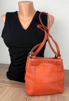 Clarks Orange Pebbled Leather Shoulder Bag  on mannequin to show size