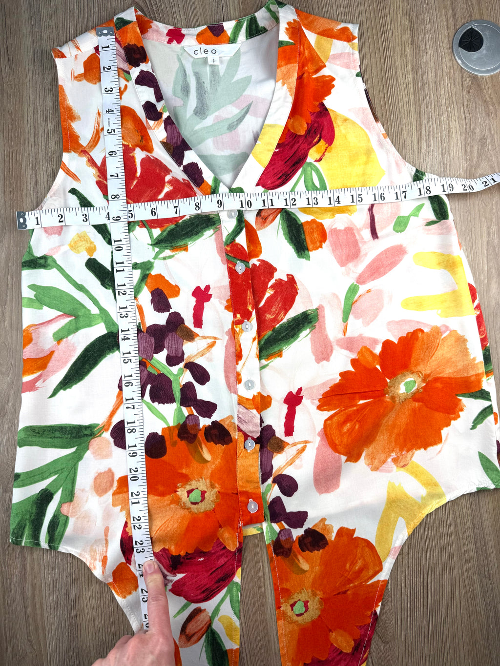 Cleo tie-front V-neck floral blouse in bold painterly orange red and green botanical print measuring 38" bust and 23" shoulder to hem minus tie 