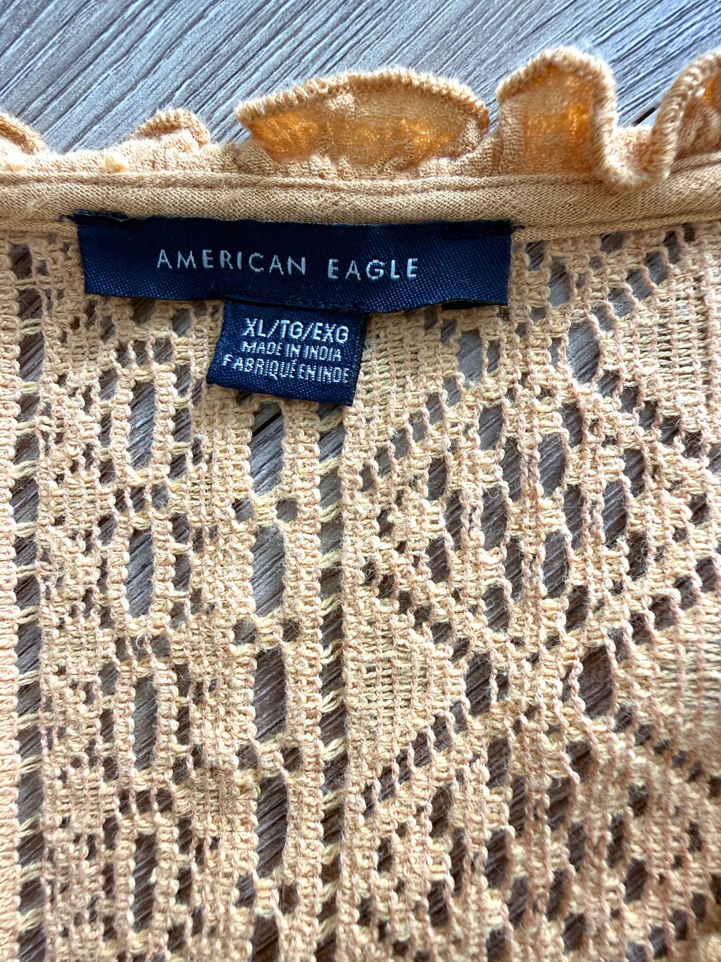 Close-up of American Eagle label showing size XL.