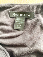 Close-up of Athleta brand label showing size L/P G/P and Designed in San Francisco detail.