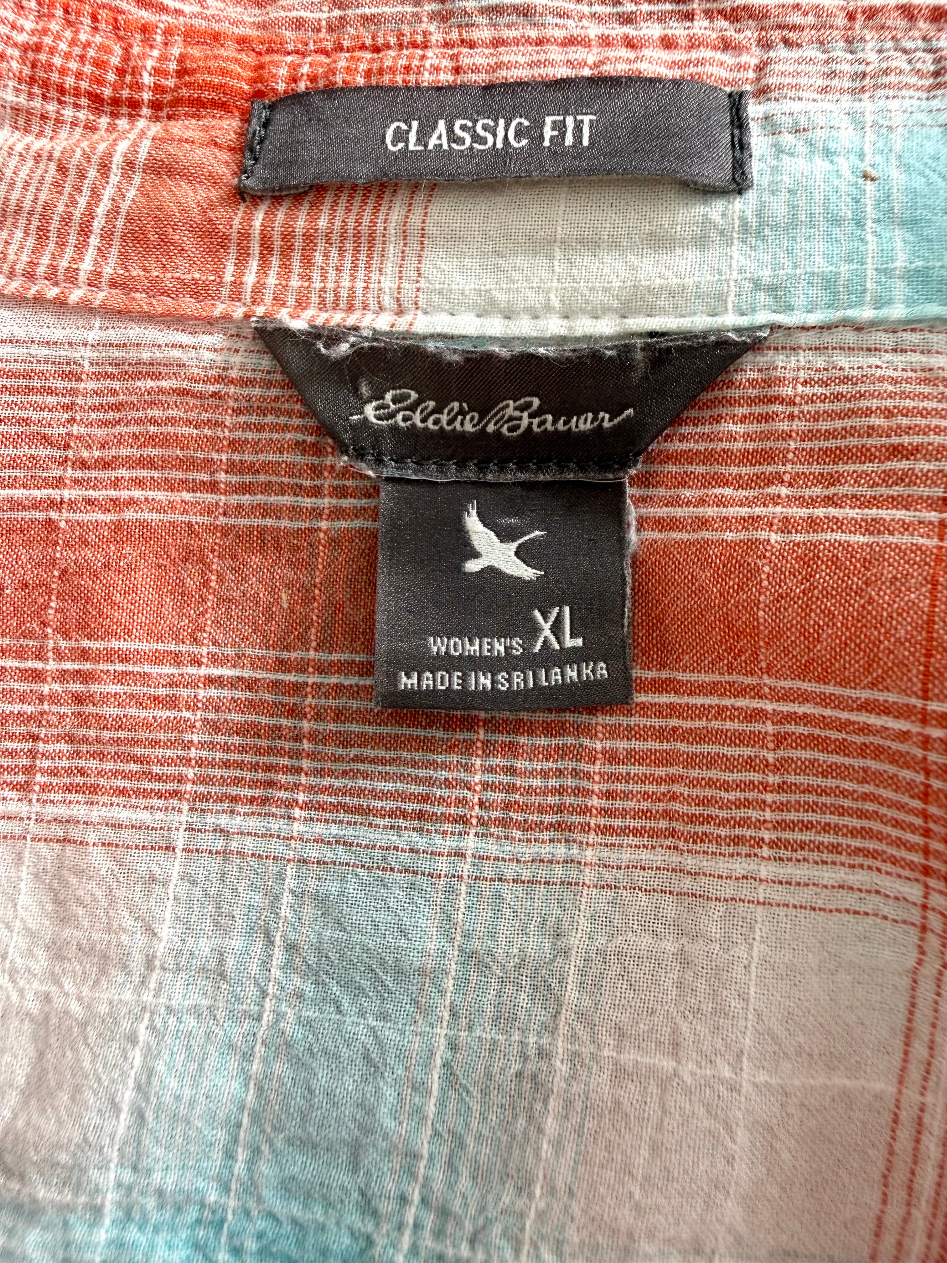 Close-up of Eddie Bauer label showing women’s XL classic fit.