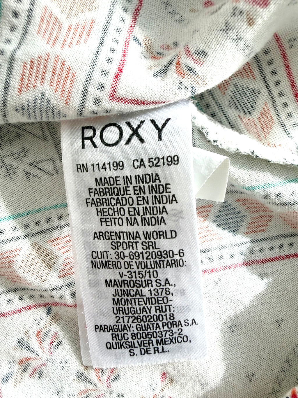 Roxy blouse care tag made in India label close up