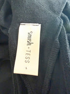 Smash + Tess Mia Jumpsuit label close up.