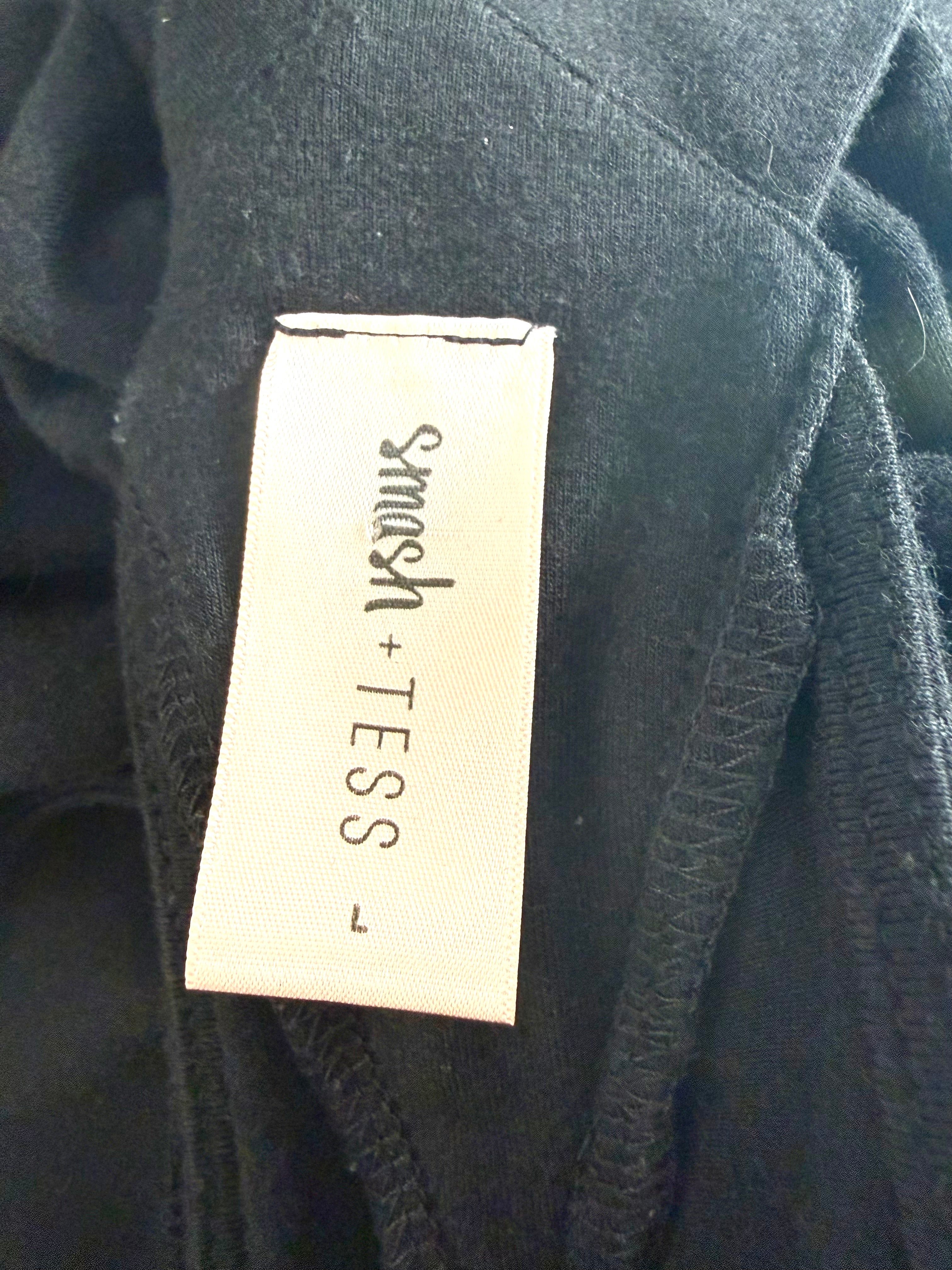Smash + Tess Mia Jumpsuit label close up.