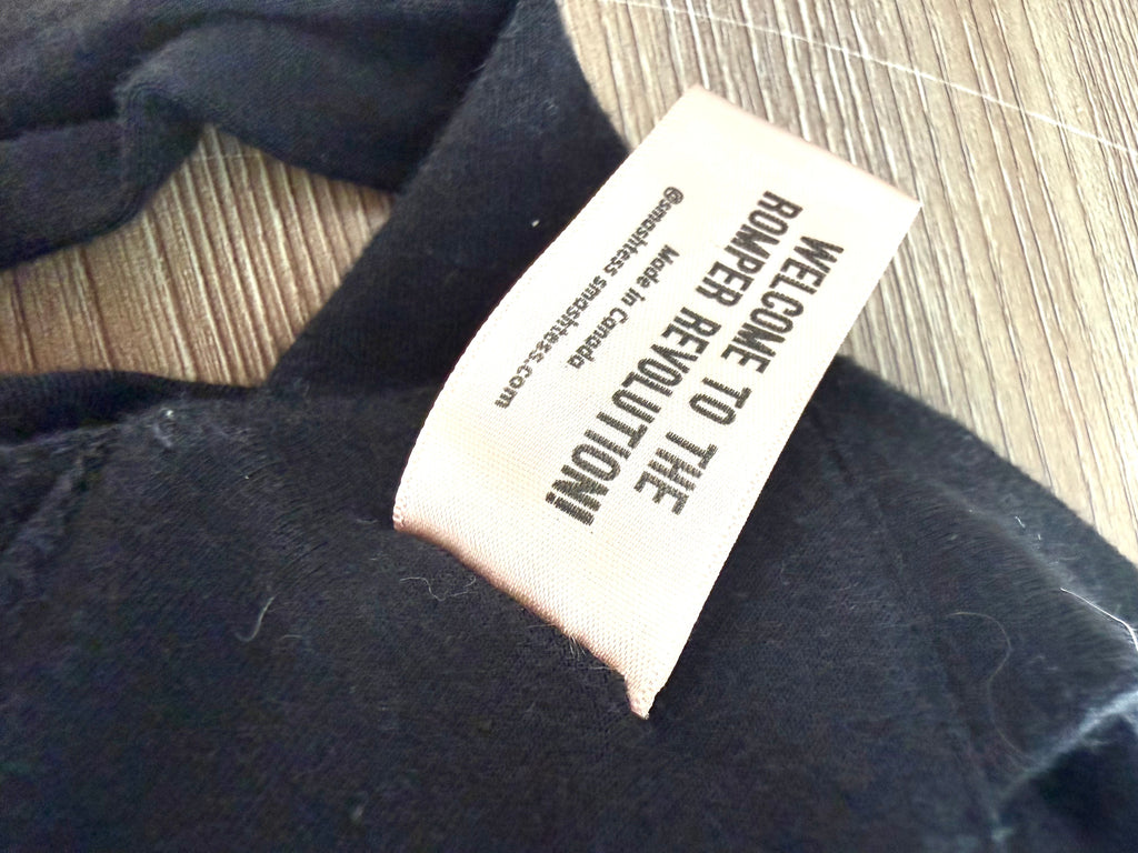Smash + Tess romper revolution tag detail.