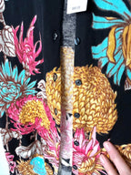 Close up of buttons on 100% cotton NWT floral Lord & Taylor cardigan 