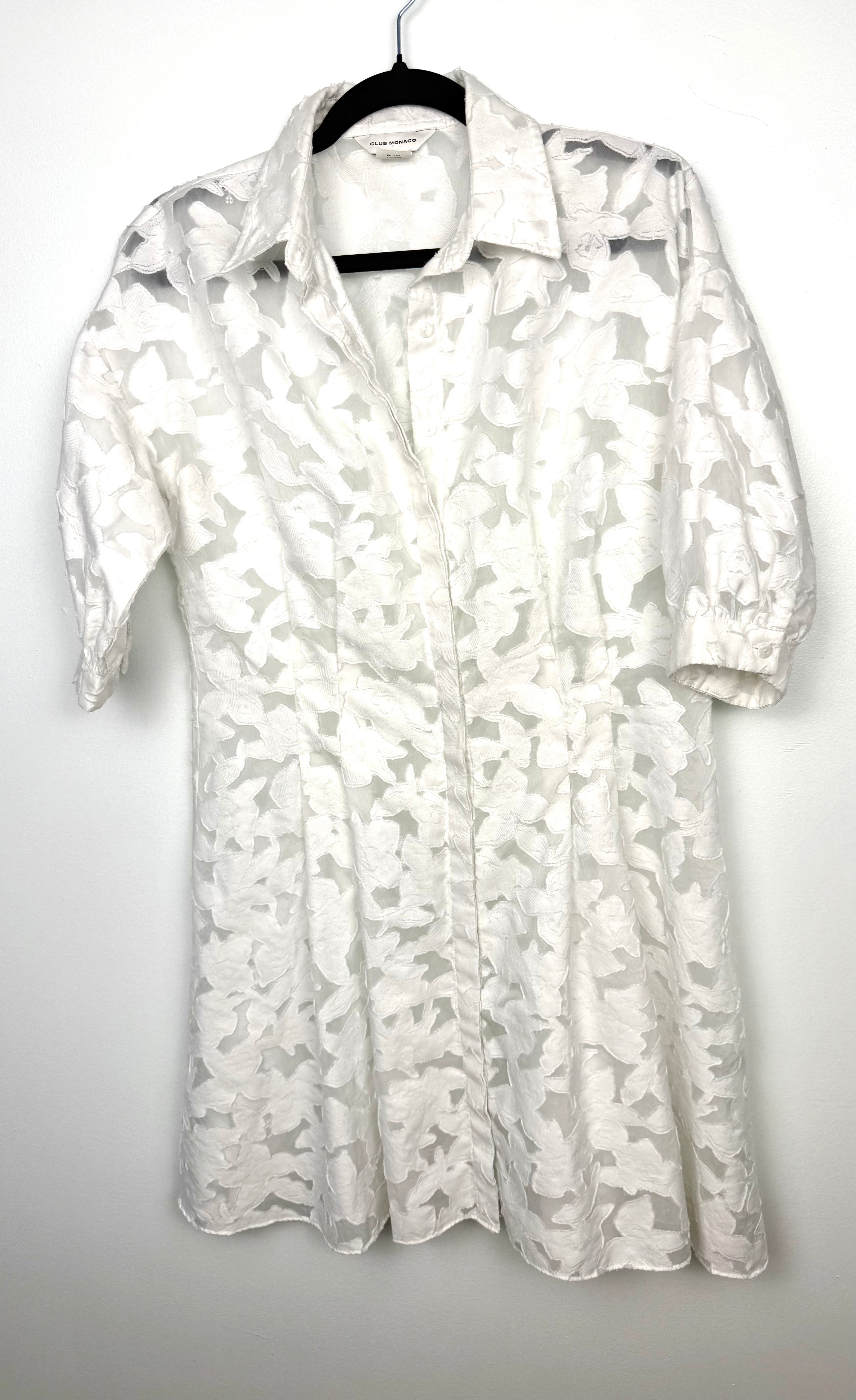 Club Monaco white burnout shirt dress with brocade pattern  on hanger
