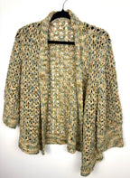 Cottagecore Handmade Crochet Cardigan in earth tones  on hanger