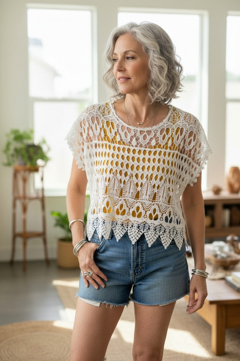 Crochet Boho Layering Top | One Size at Blue Sparrow Shop on woman wearing denim shorts and yellow tank