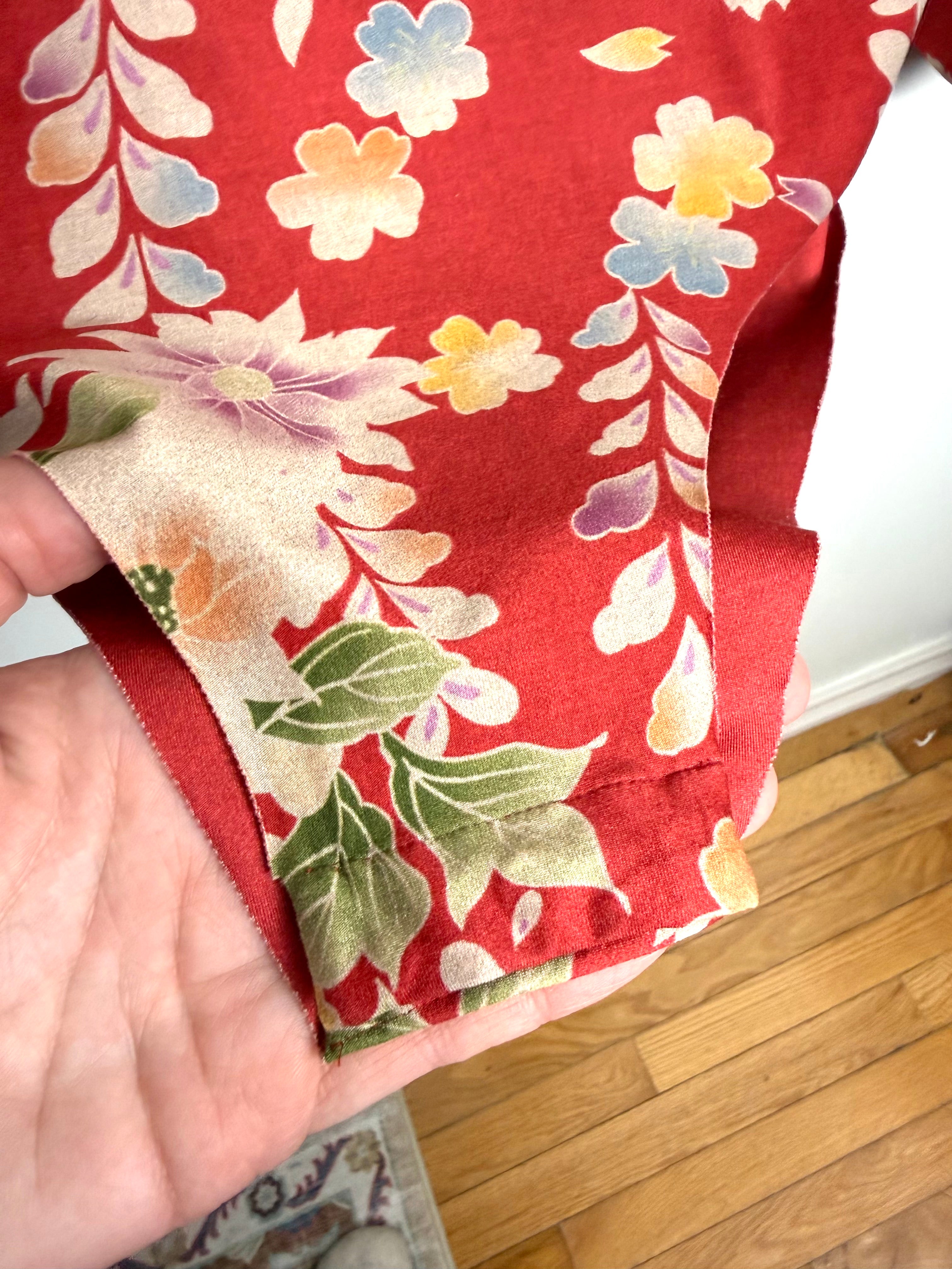Crotch area of red floral Zara Long Sleeved jumpsuit/one piece/ bodysuit 