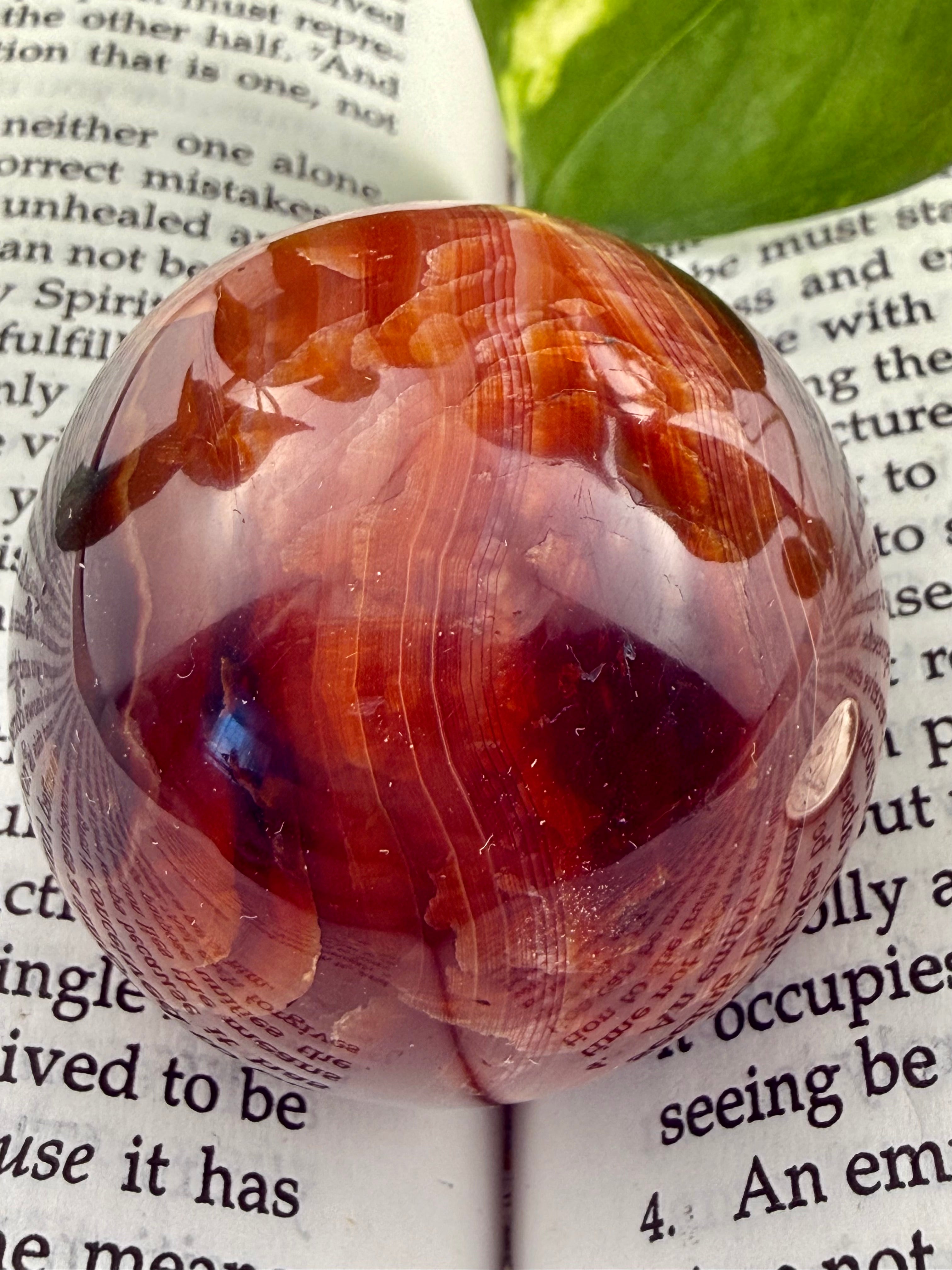 up close of carnelian sphere with striations