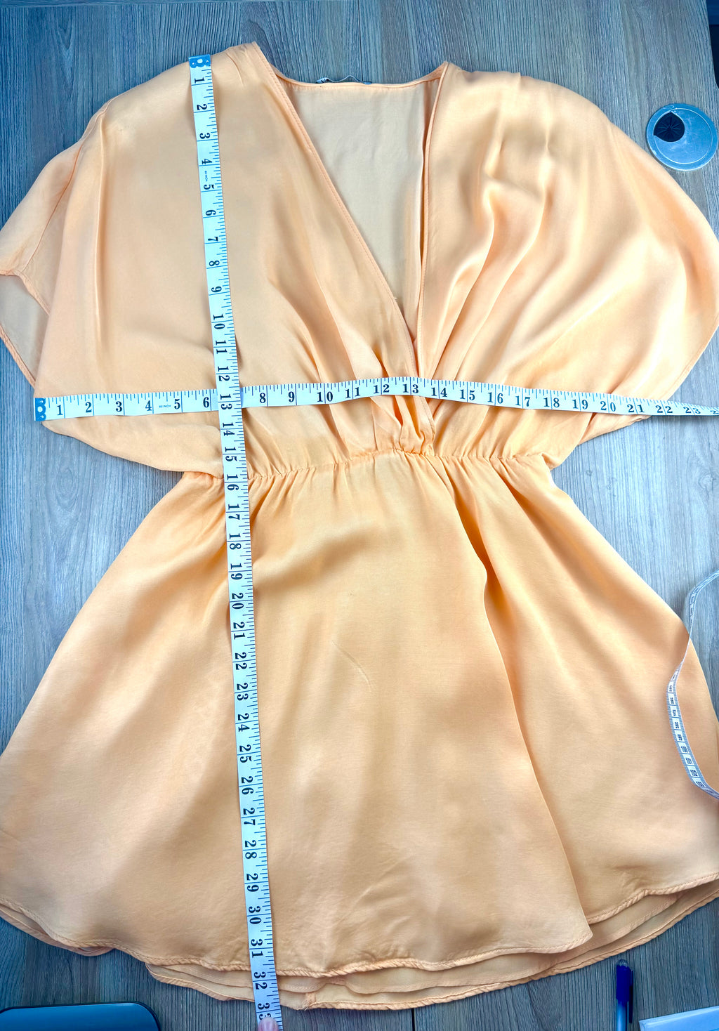 Deep V Neck Zara peach dress with batwing sleeve fully lined  measuring 44" bust and 32" shoulder to hem 