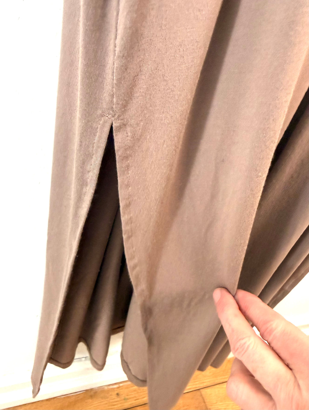 Athleta taupe maxi dress hem and side slit detail close up