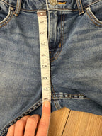 Dex embroidered feather skinny jeans medium wash distressed raw hem at Blue Sparrow Shop measuring 8" rise