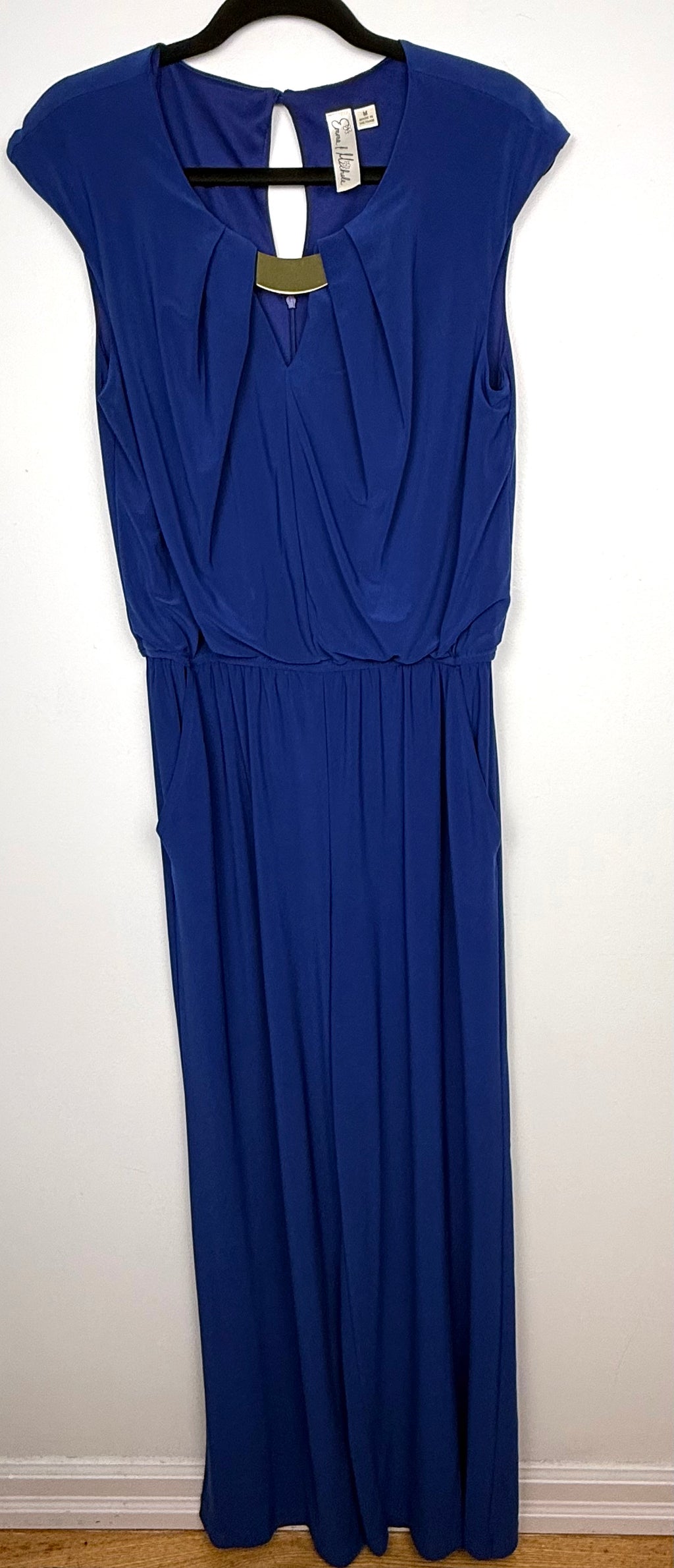 Emma & Michele cobalt blue sleeveless draped pleated bodice jumpsuit at Blue Sparrow Shop on hanger
