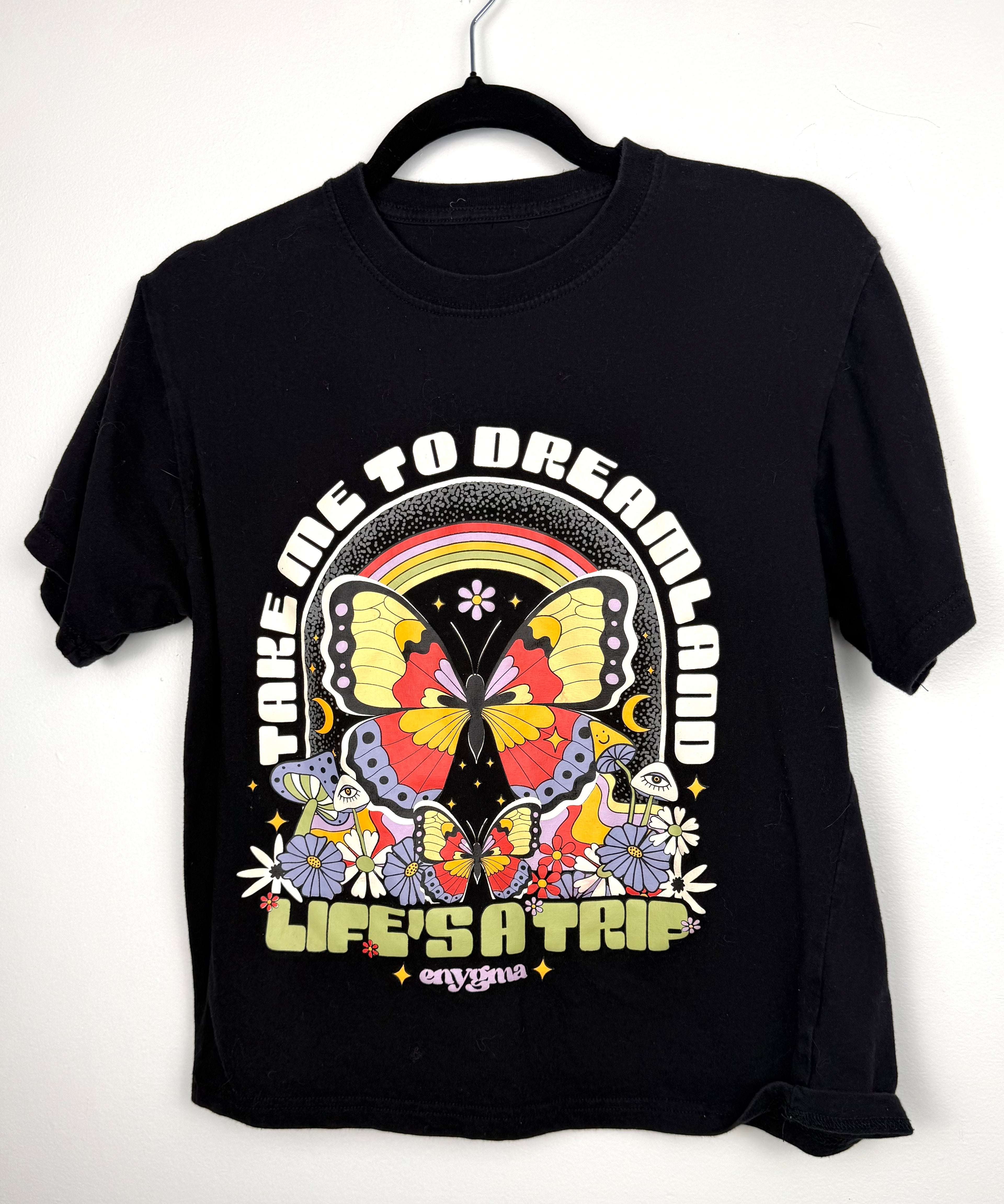 Enigma psychedelic butterfly graphic t shirt on hanger