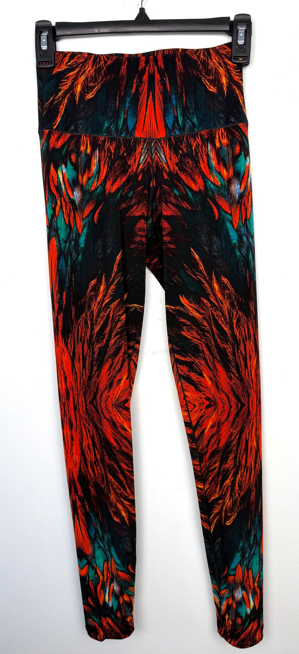 Eva Varro Reversible Leggings — Feather Print & Solid Turquoise | Handcrafted in USA | Size XS at Blue Sparrow Shop  on hanger