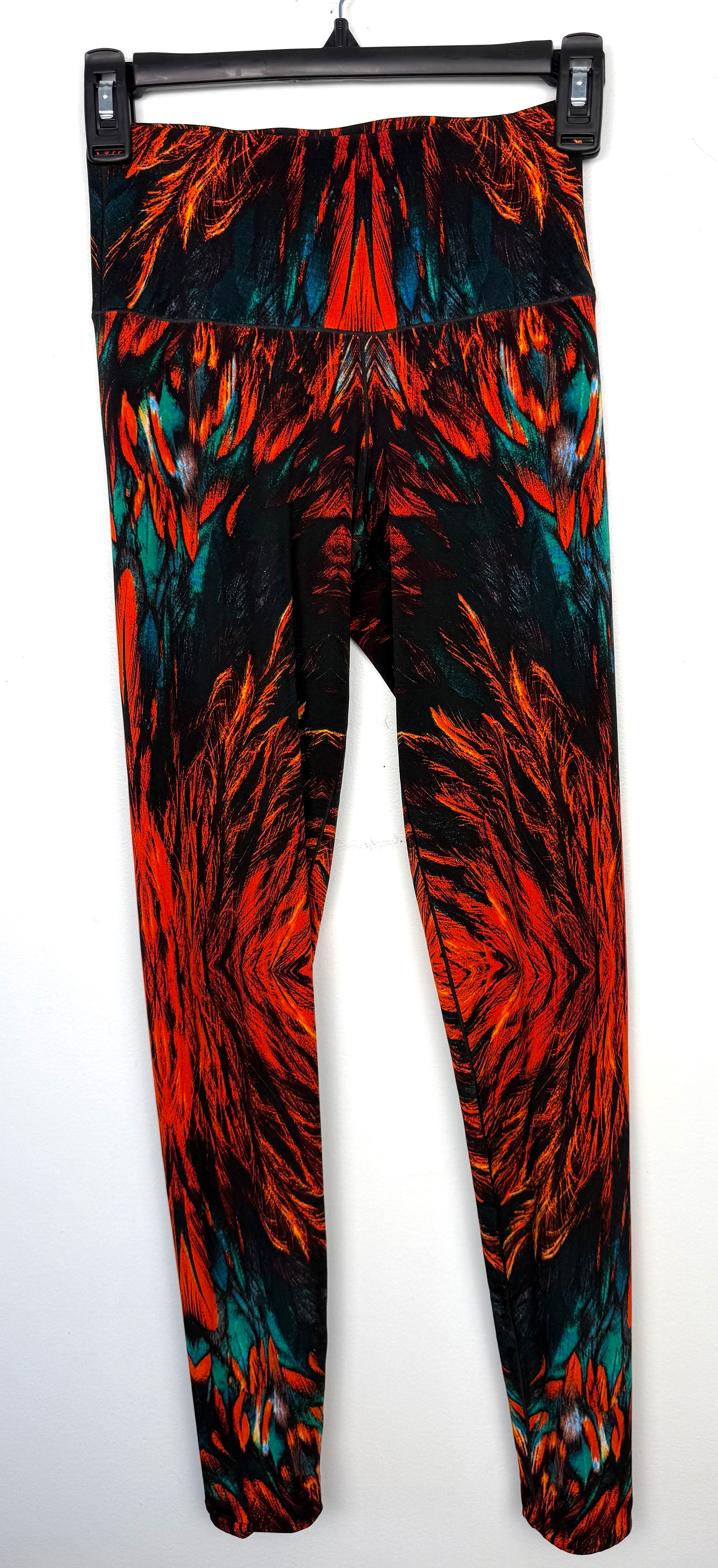 Eva Varro Reversible Leggings — Feather Print & Solid Turquoise | Handcrafted in USA | Size XS at Blue Sparrow Shop  on hanger
