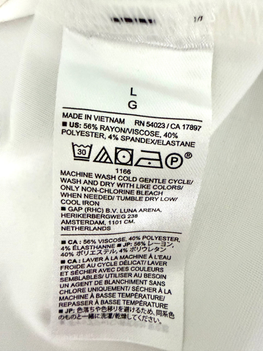 Fabric content tag rayon polyester spandex blend inside Banana Republic Sleeveless Top 