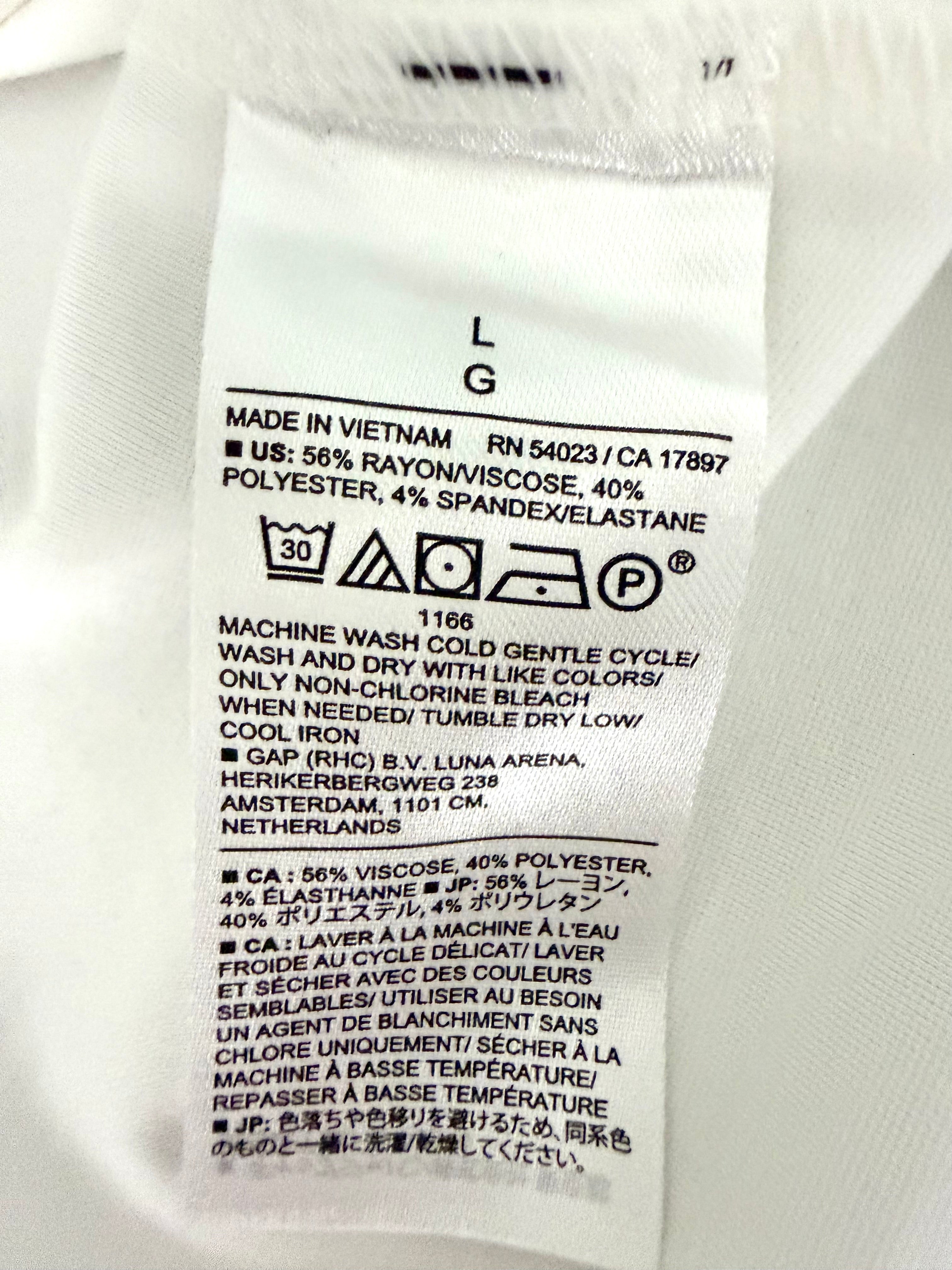 Fabric content tag rayon polyester spandex blend inside Banana Republic Sleeveless Top 