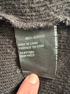 Fabric content tag showing 100 percent acrylic material