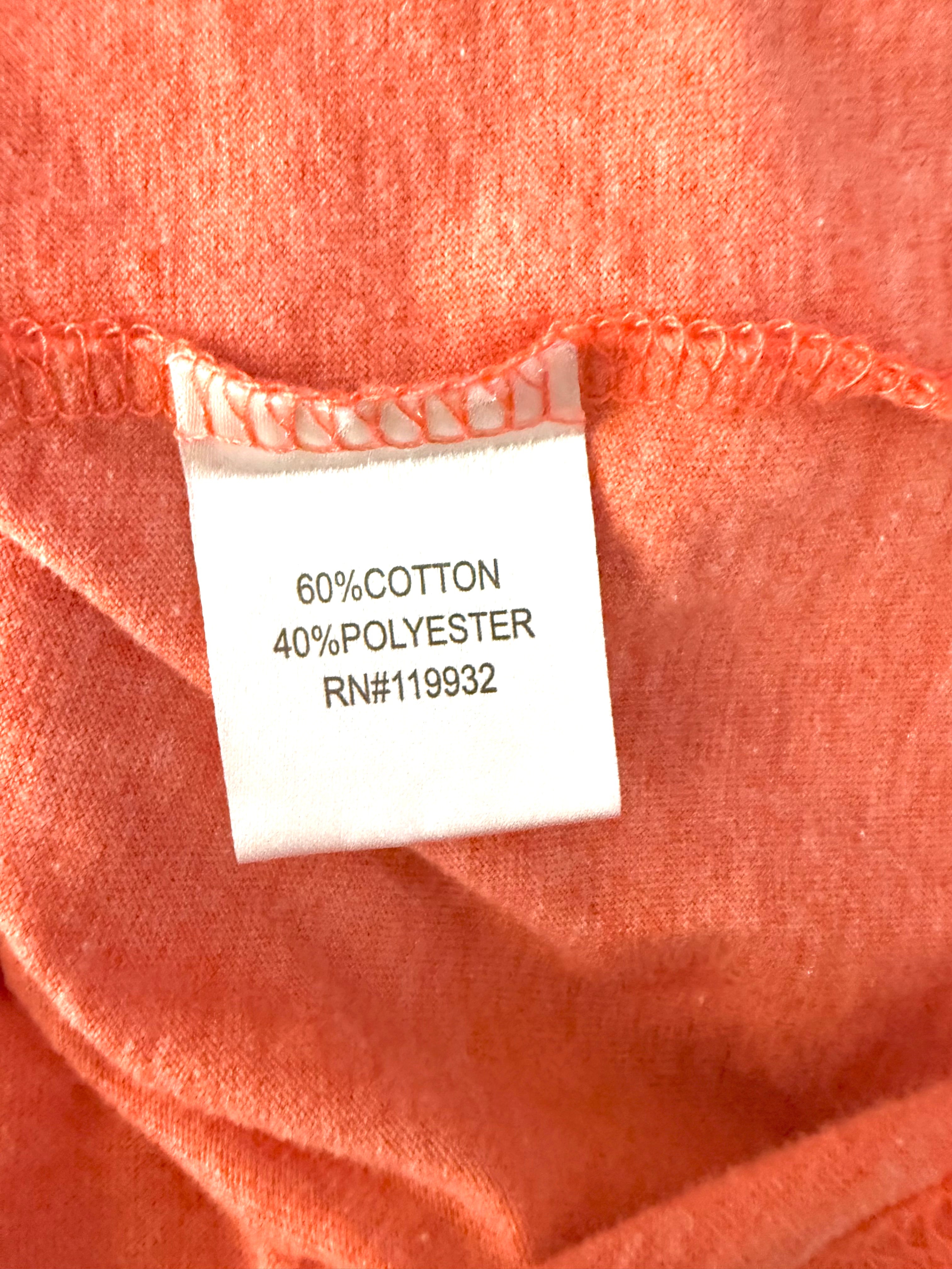 Fabric content tag showing 60% cotton, 40% polyester blend on Garth Brooks concert tee
