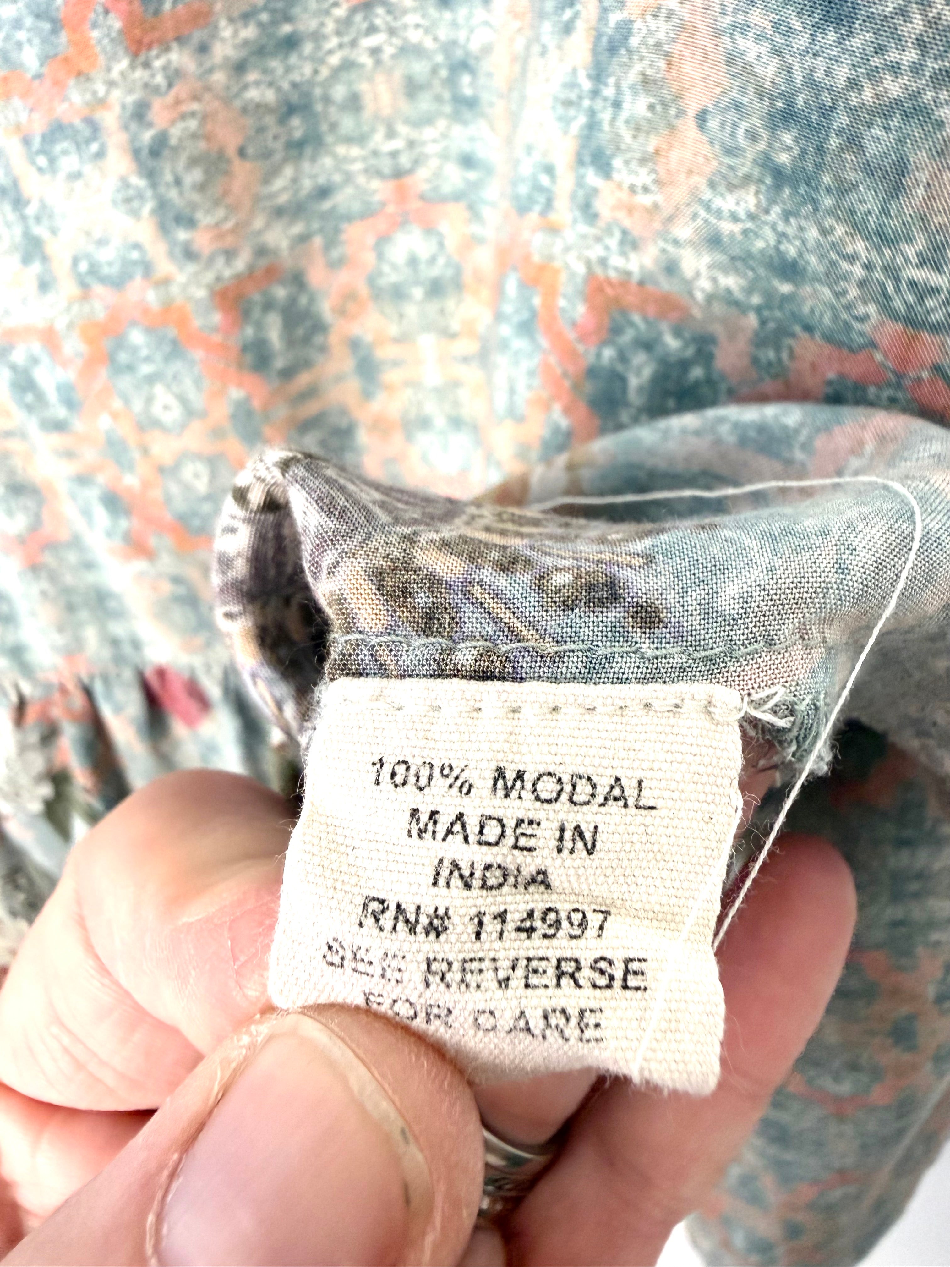 Fabric tag showing 100% modal composition and made in India manufacturing details on Mahla women’s blouse.