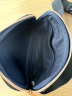 Floral cross body belt bag in navy inside 