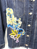 front decal detail on Chicos embroidered denim jacket 