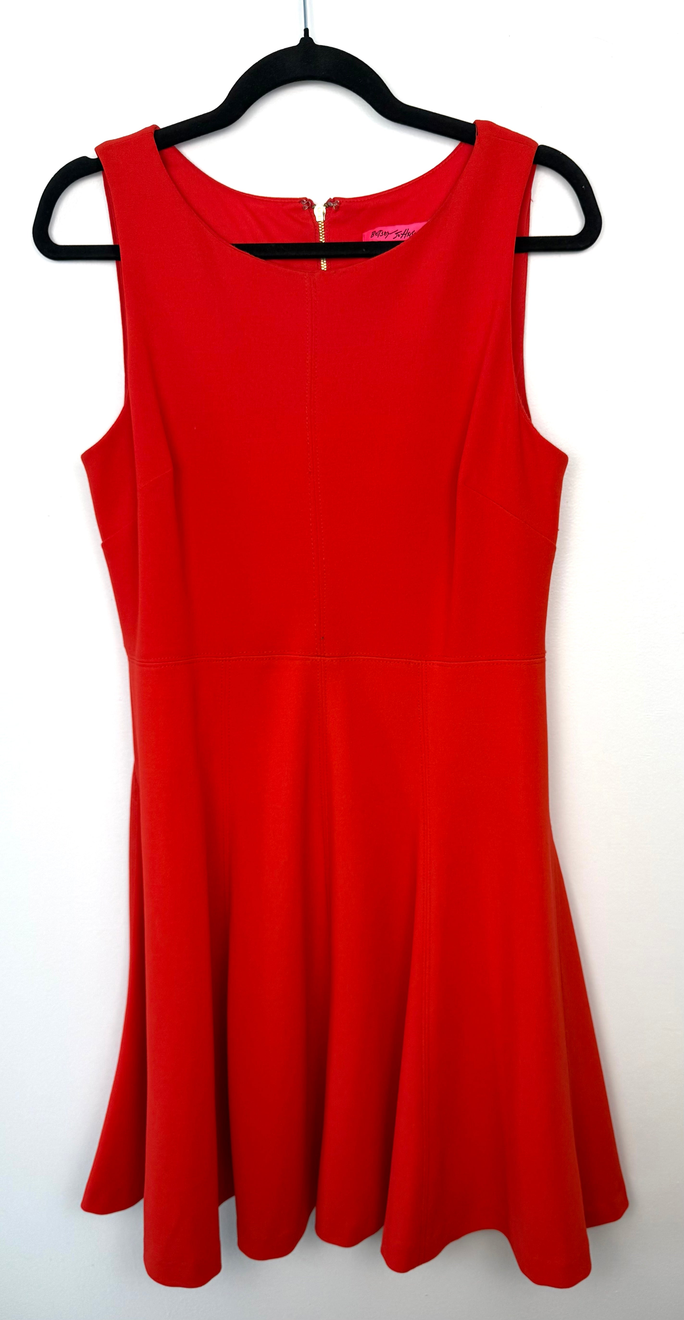 Betsey Johnson red sleeveless fit and flare dress size 10 front view with scoop neckline and structured waist seam.