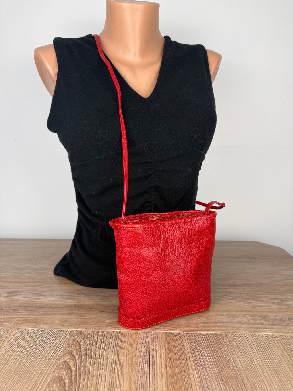 Vintage Laurentian Chief red leather crossbody bag front view, made in Canada pebbled leather purse