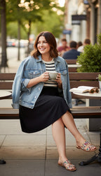 GAP 100% Cotton Sleeveless Fit-and-Flare Knit Dress | Size L at Blue Sparrow shop on a woman wearing a jean jacket on a park bench