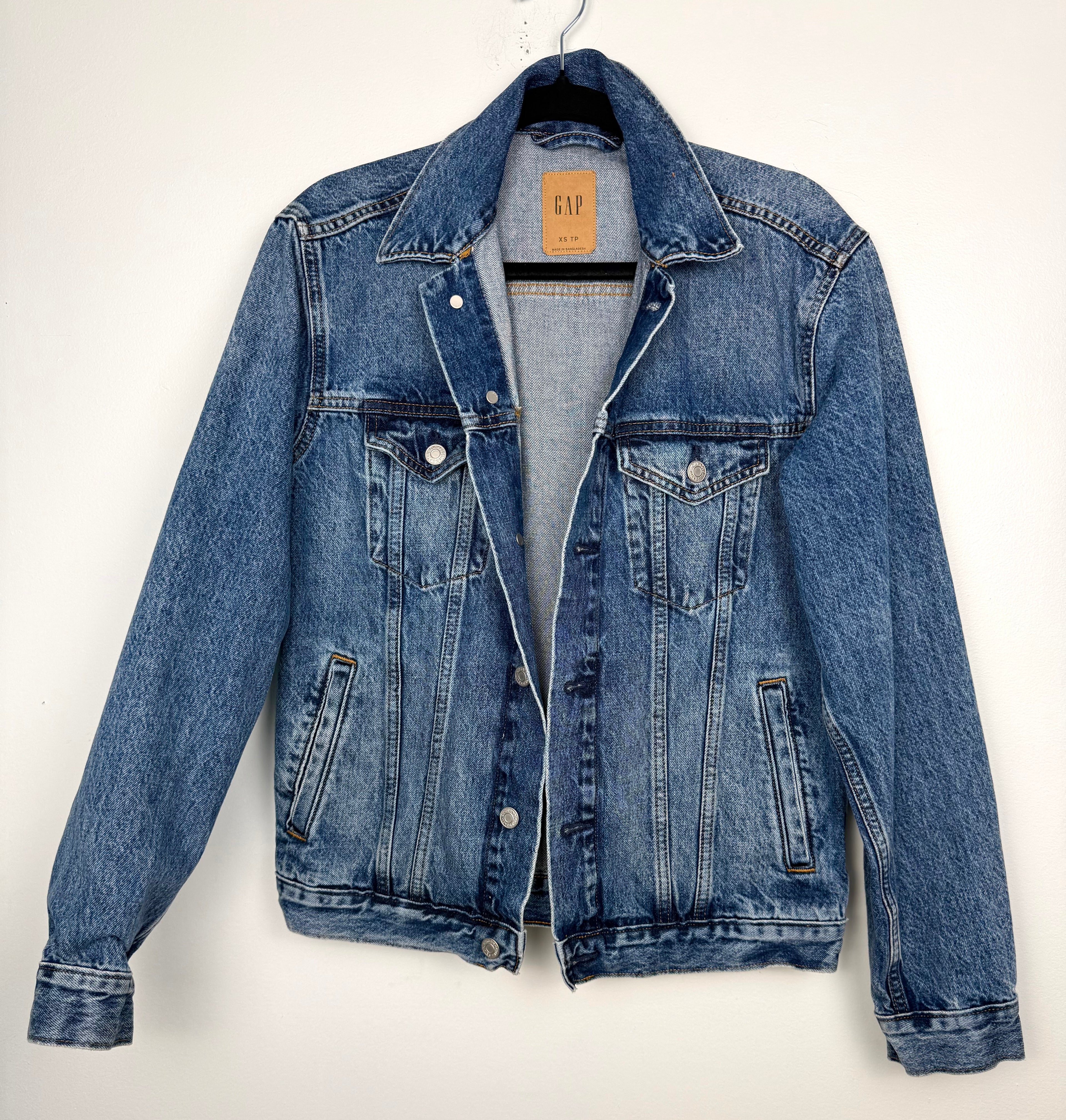 GAP Classic Denim Trucker Jacket | Oversized XS at Blue Sparrow Shop on hanger