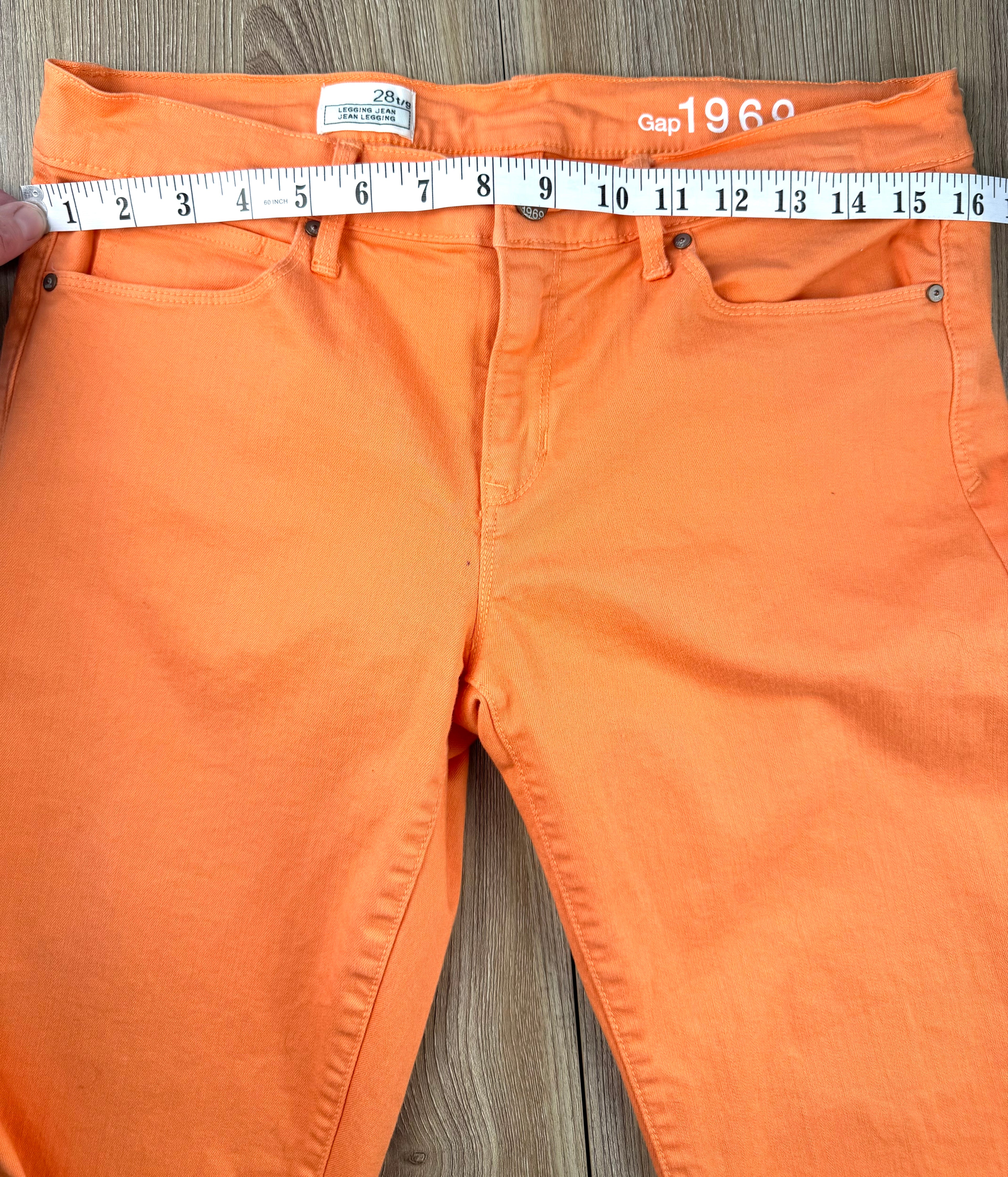 Gap 1969 orange jean leggings measuring 32" waist 