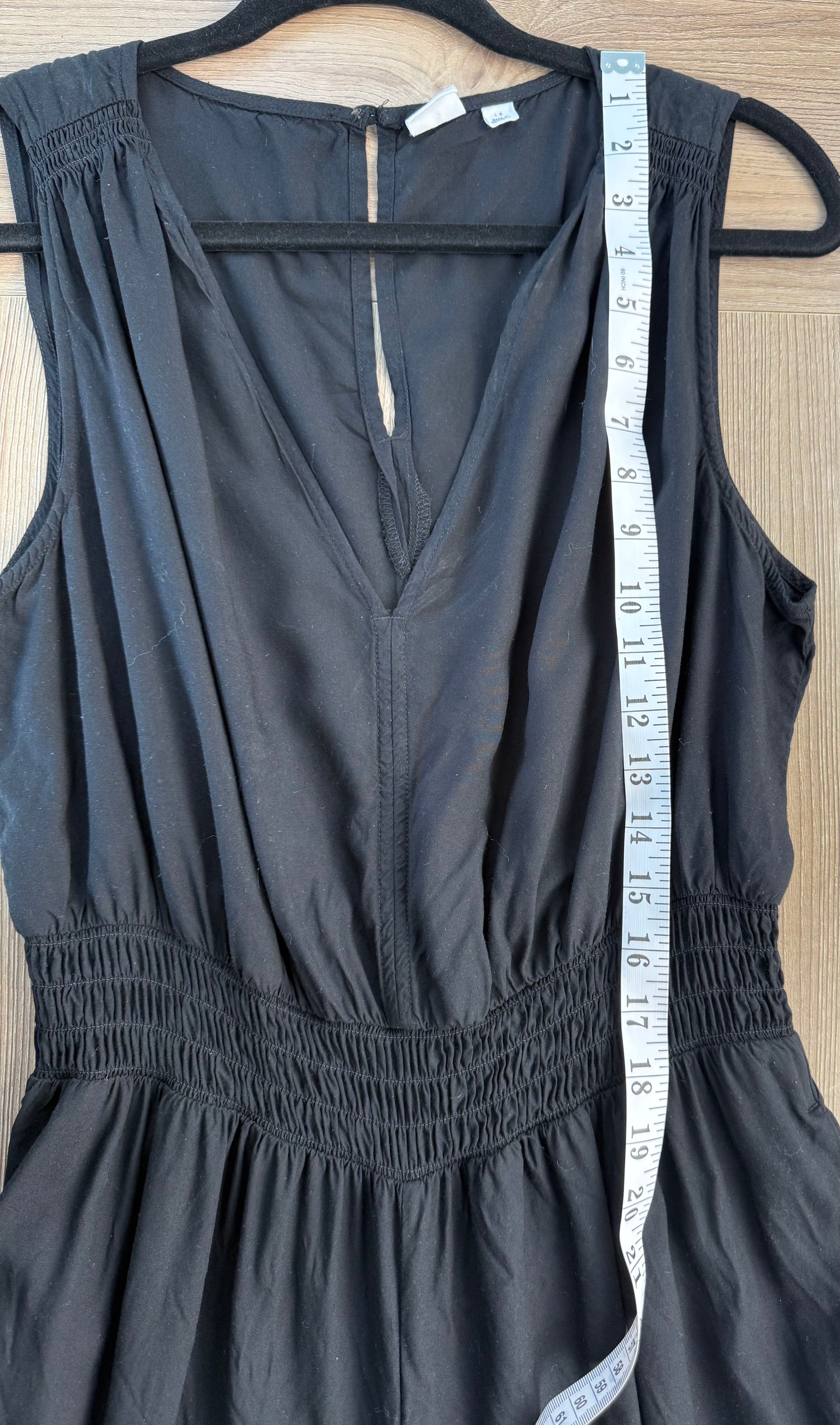Gap Jumpsuit Measuring shoulder to waist 17"