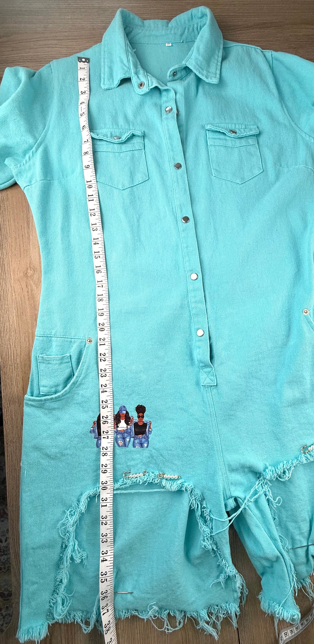 Graphic Streetwear Jumpsuit measuring 38" shoulder to hem