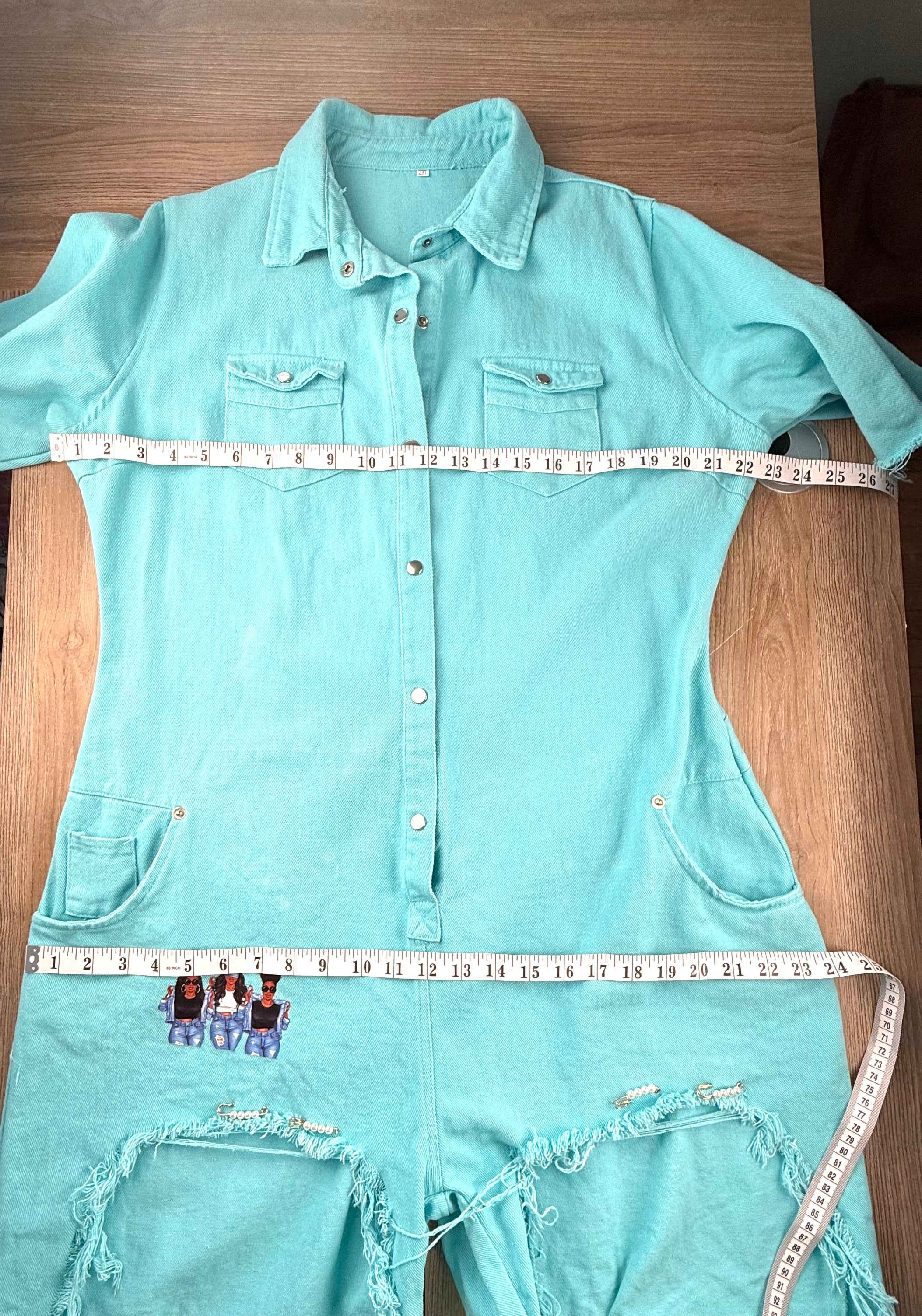 Graphic Streetwear Jumpsuit measuring 44" bust and 48 hips 