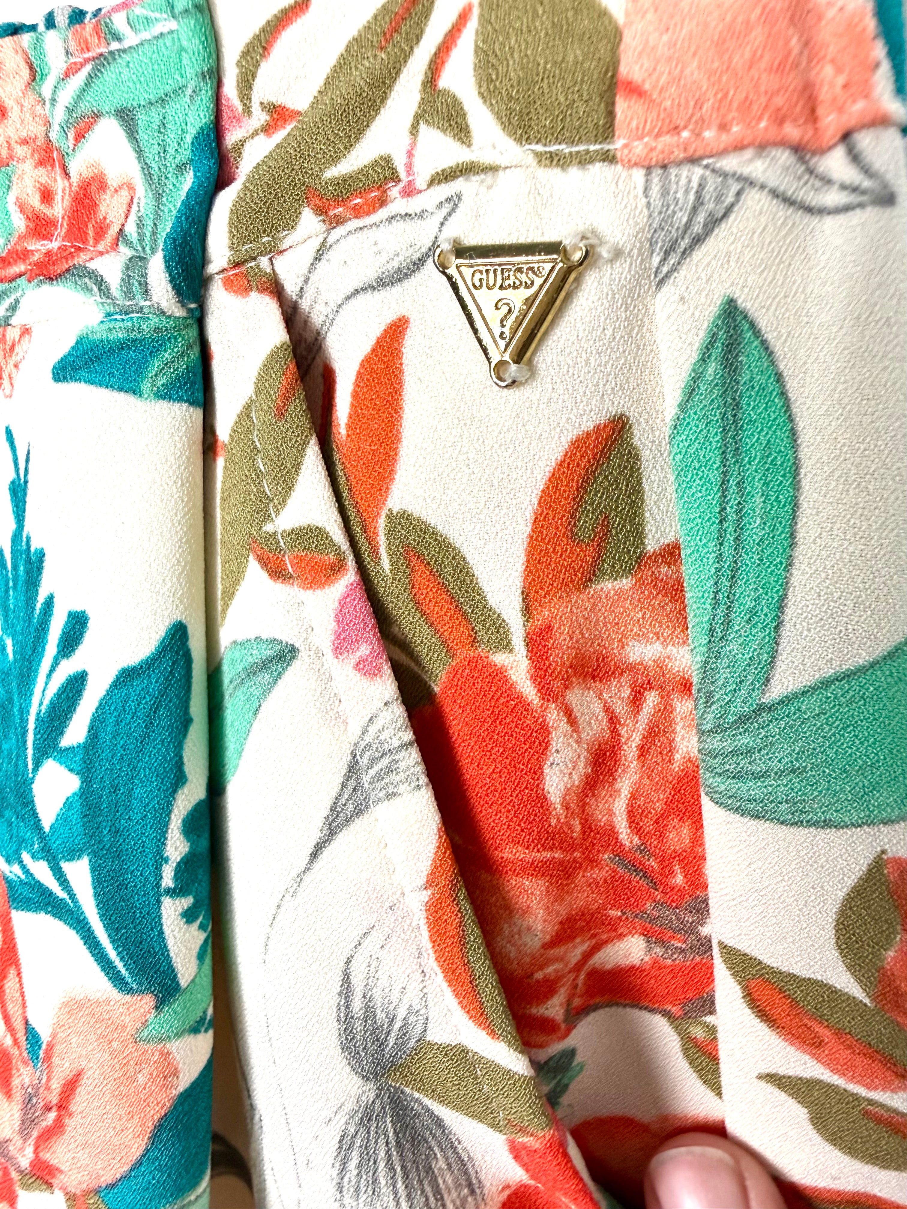 Guess emblem and front pocket on Guess  Floral Jogger Style Dress Pants at Blue Sparrow 