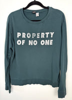 H&M Divided teal green 100% cotton graphic crew neck sweatshirt with "Property of No One" distressed white lettering, front view on hanger — Blue Sparrow pre-loved women's fashion front view on hanger