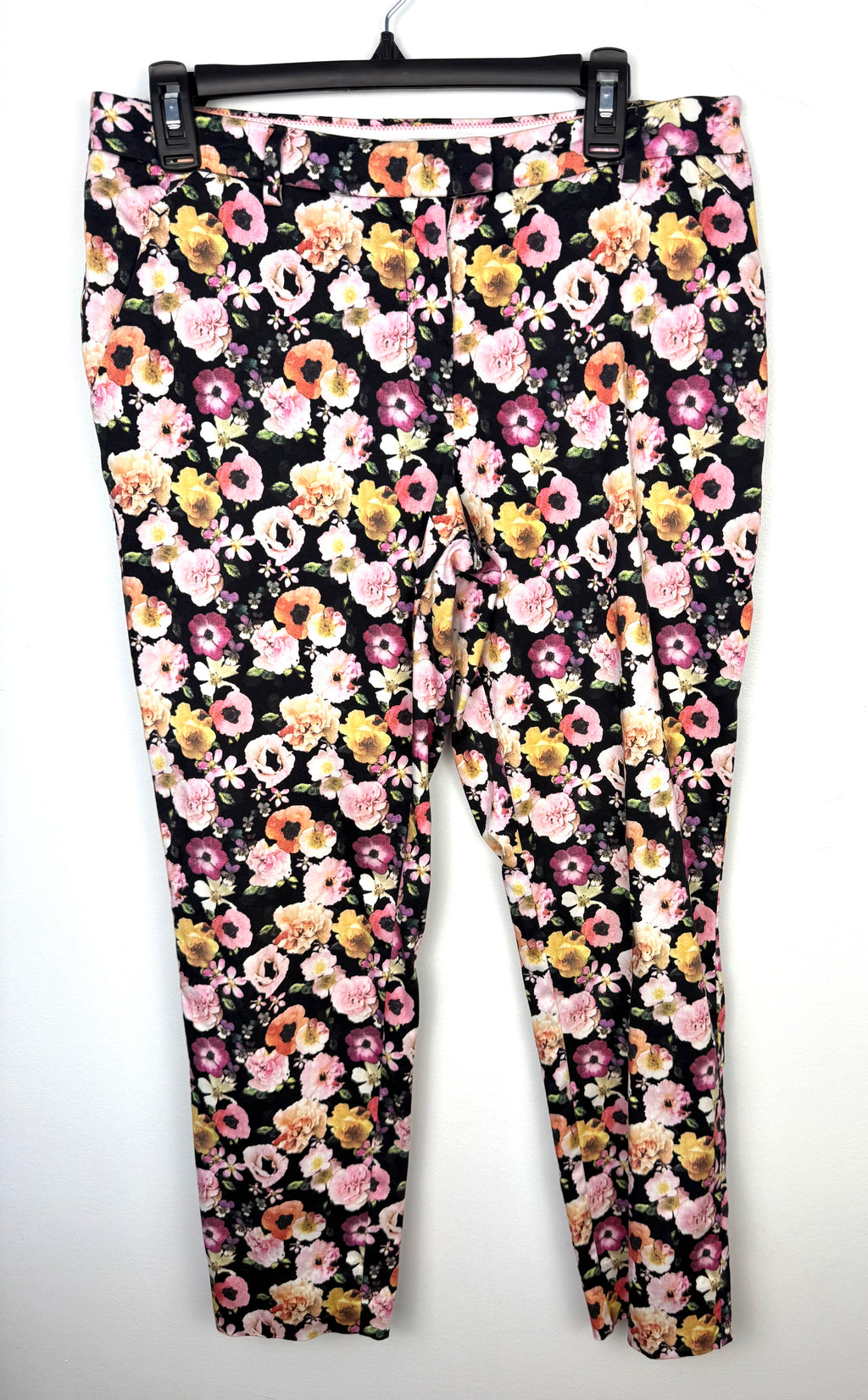 H&M Slim Fit Ankle Pants with floral pattern  on hanger