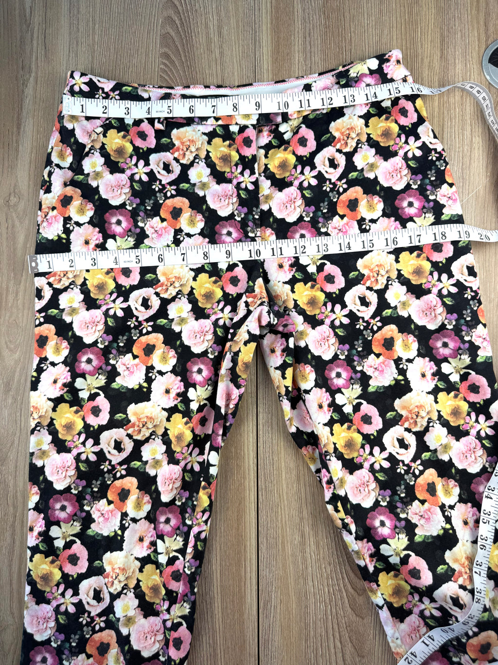 H&M Slim Fit Ankle Pants with floral pattern  measuring 32" waist and 38" hips 